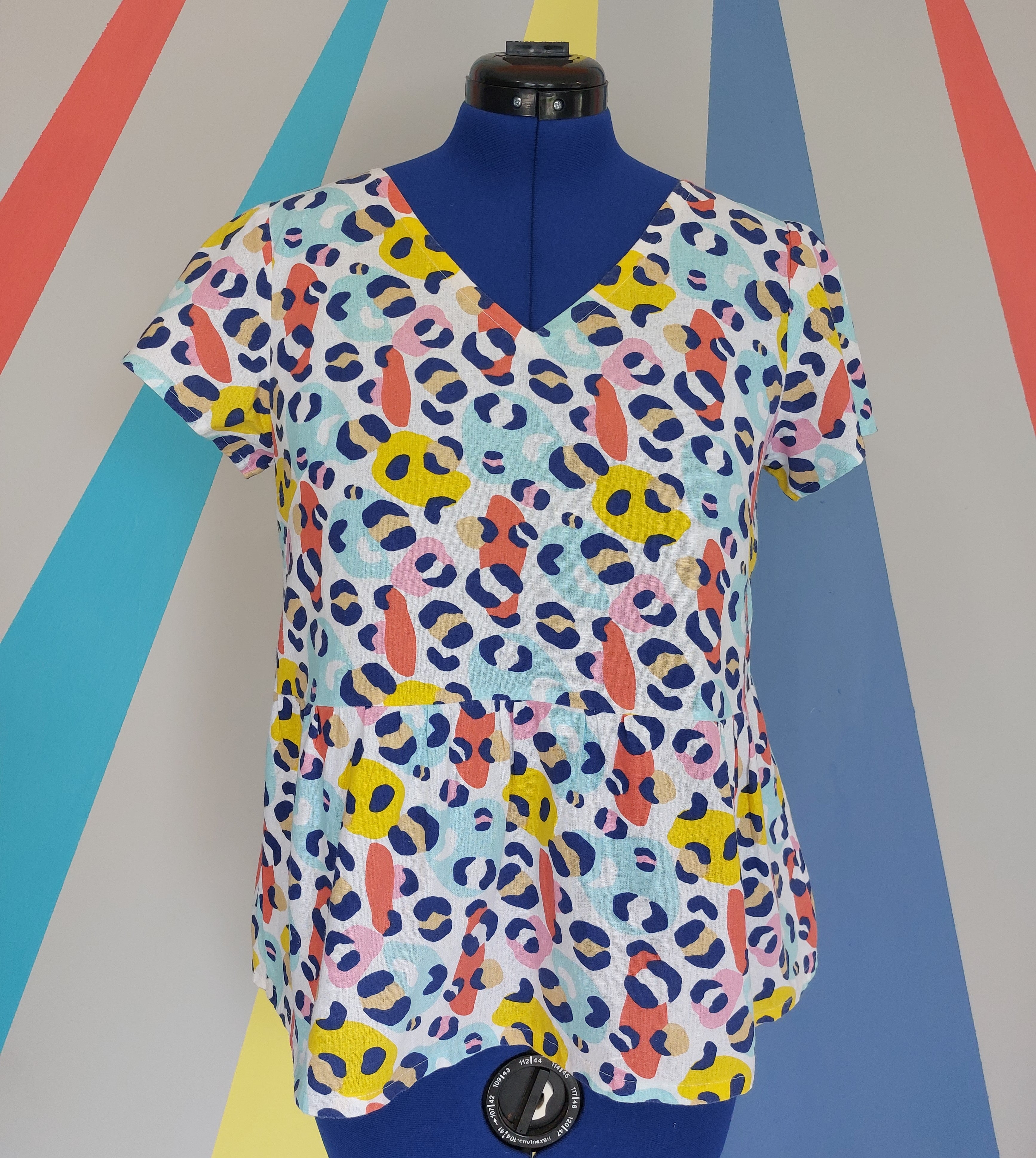 Size M Nelly Peplum Top in Animal Bright Sample Sale