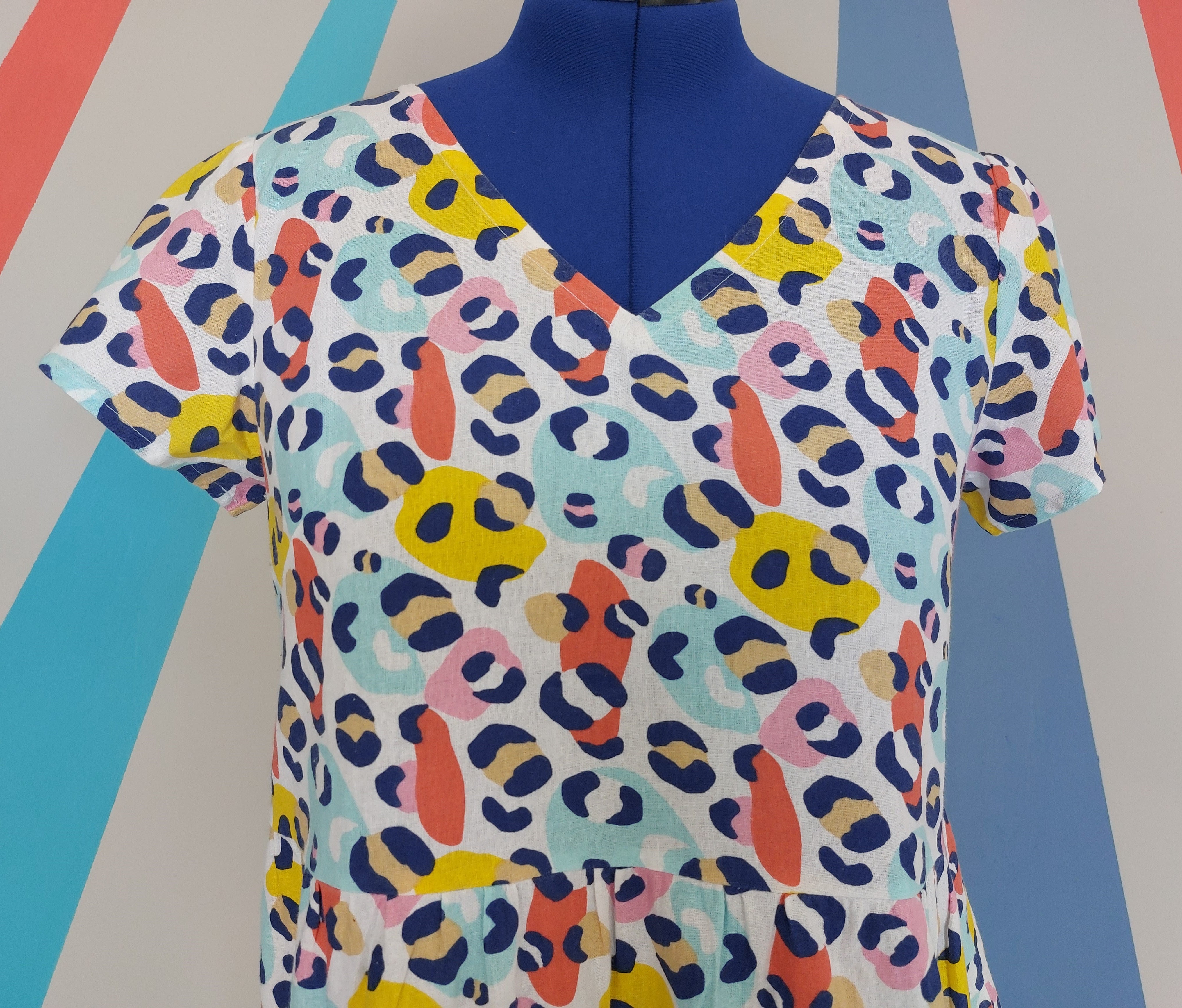 Size M Nelly Peplum Top in Animal Bright Sample Sale